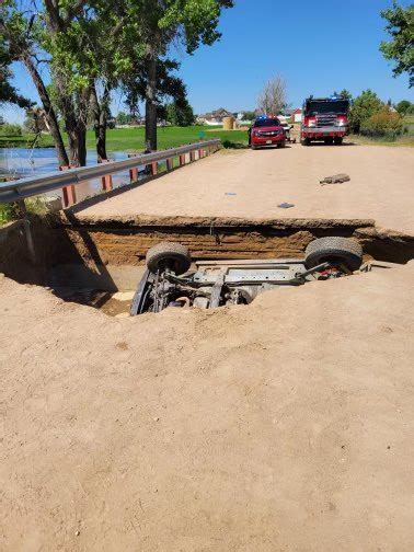 SUV lands upside down in sinkhole